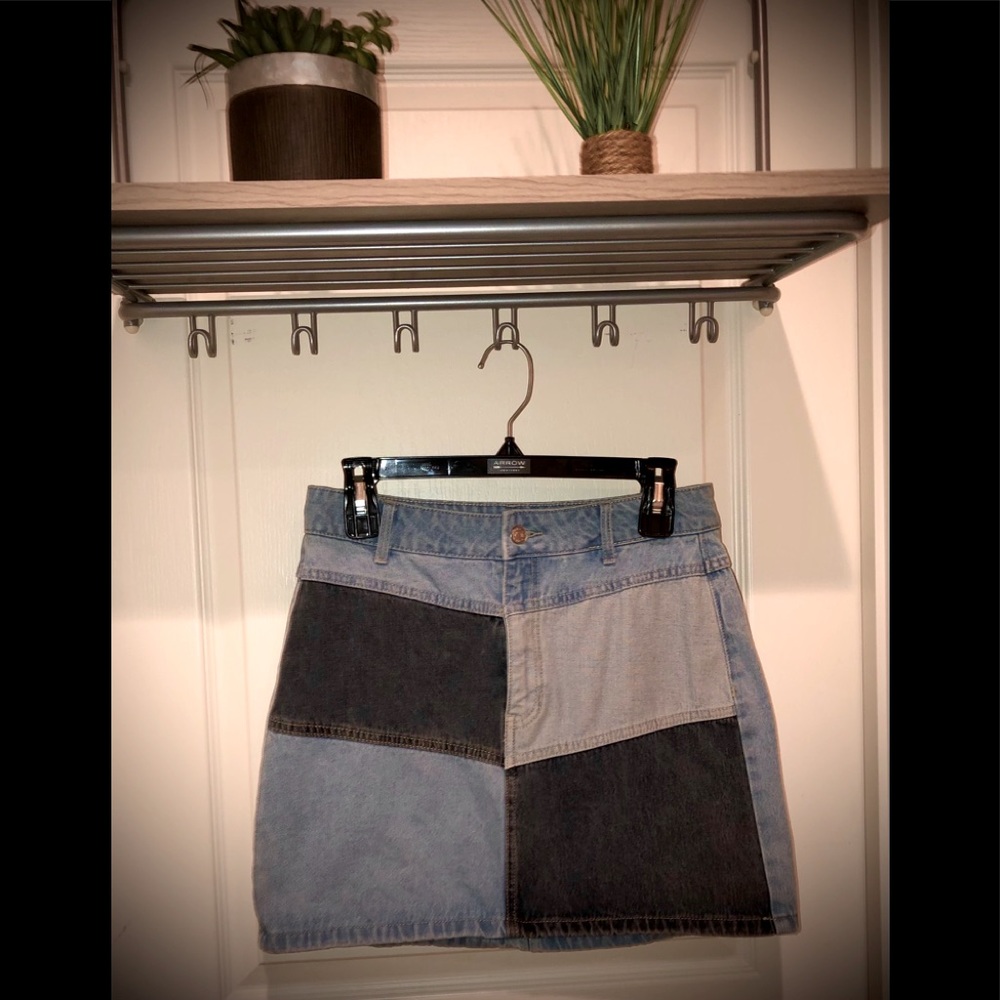 Two tone patched mini jean skirt.